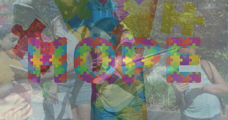 Image of hope text over diverse schoolchildren