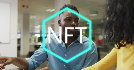 Image of nft over diverse female and male coworkers in office