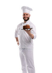 Happy confectioner in uniform holding delicious chocolate cake on white background