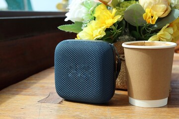 Blue bluetooth speaker on teble