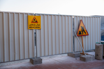 construction site sign, Men at work sign at construction site