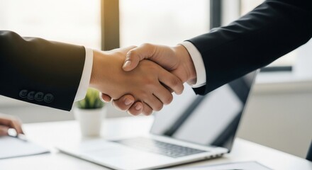 Business Handshake: Two Men in Suits Seal a Deal with a Firm Grip