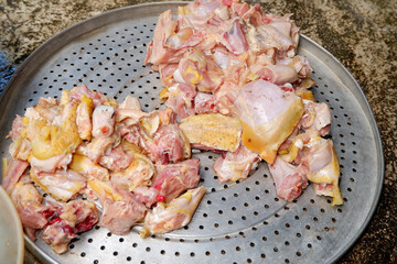 This is freshly cut chicken meat, ready to cook
