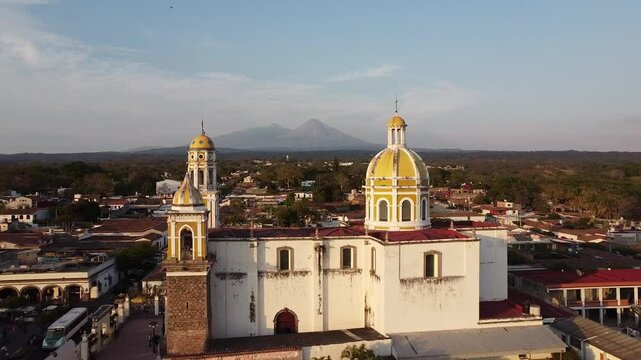 Drone flying to the colima's volcanoes above San Miguel Arcangel church in the magic town of Comala