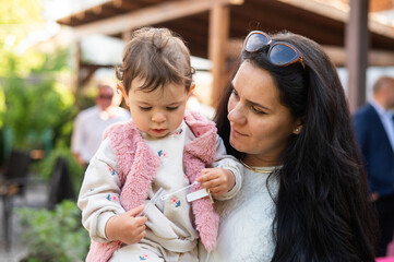 happy young mother with baby girl