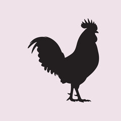 vector silhouette of a rooster on a pink background	
