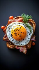 Fried egg and bacon on toasted bread.