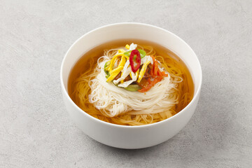  Janchi Guksu refers to noodles that are mainly eaten on feast days. It is a dish made with noodles in a hot clear soup and various toppings.