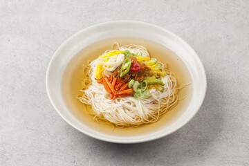  Janchi Guksu refers to noodles that are mainly eaten on feast days. It is a dish made with noodles in a hot clear soup and various toppings.