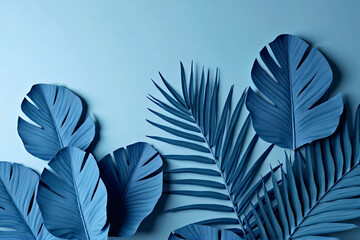 Collection of tropical leaves,foliage plant in blue color with space background