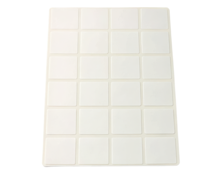 Blank white adhesive labels organized in a neat grid layout on a transparent background