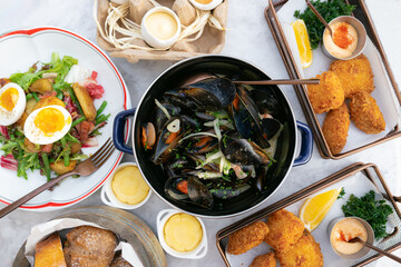 Elegant Seafood and Salad Spread on Marble White Table