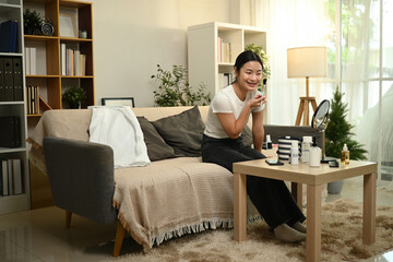A Teen Girl Enjoying Her Daily Makeup Ritual, Beauty Routine at Home Concept