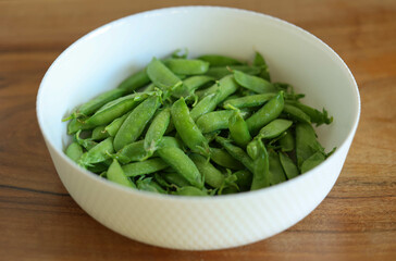 Peas in a white bowl. High quality photo