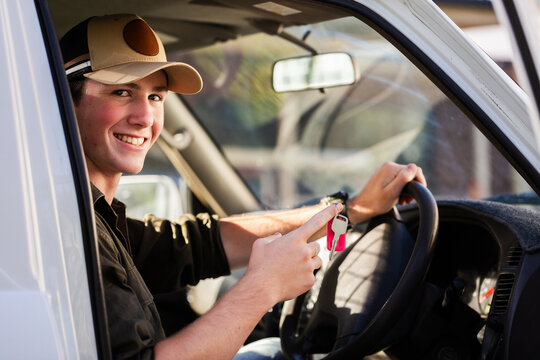 Young P plater provisional driver with the keys for his first car - a ute