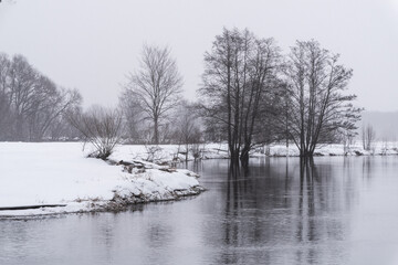 Winter Landscape Belarus. River in the Forest covered With Snow