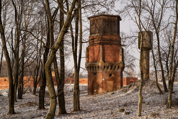 Old brick Tower in the Park in snowy Winter
