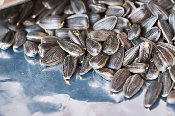 Sunflower seeds in a package. Selective focus