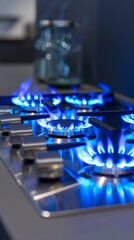 Gas stove with blue flames in a modern kitchen