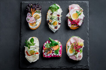 Decorated Open-Faced Sandwich isolated on black background