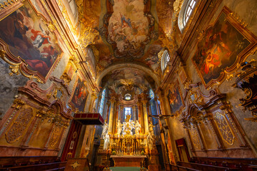 Obraz premium Interior of Cathedral Basilica of St. Emmeram showing baroque architecture and frescoes in Nitra, Slovakia