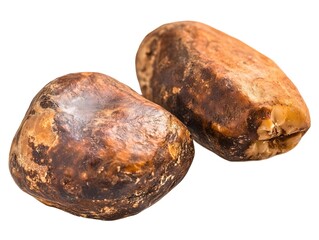 Close up shot of two african black soap bars on a white background with detailed texture and coloration