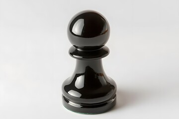 A glossy black pawn chess piece isolated on a white background in a studio setting with soft lighting