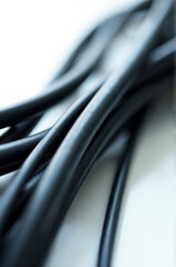 A detailed view of a collection of black electrical wires