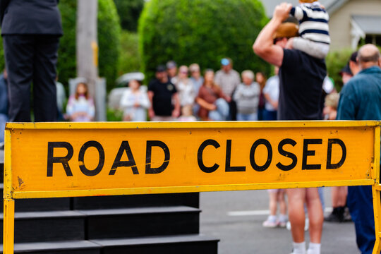 Road closed sign blocking of street for ANZAC day parade march