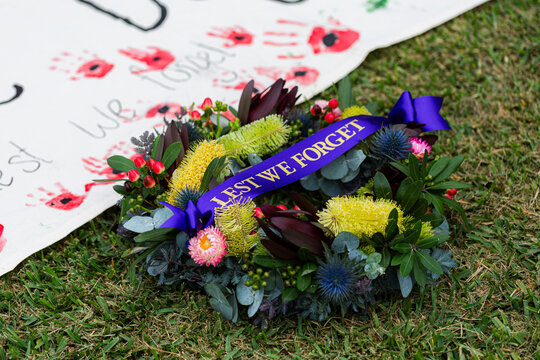 ANZAC day lest we forget wreath waiting on grass ready to be laid at memorial service