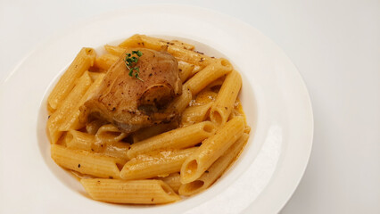 Delicious White Plate Italian Cuisine Dish Penne Ala Vodka Pasta Yellow Spicy Creamy Curry Sauce...