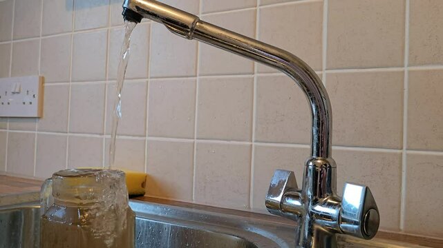 Dirty contaminated water comes from the tap.