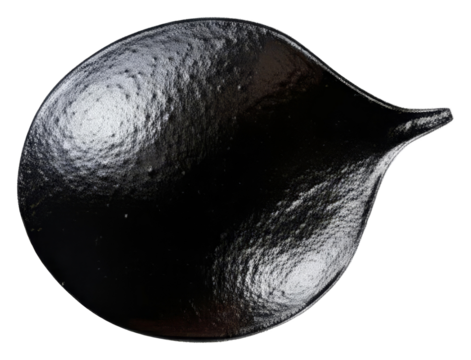 PNG Dark textured droplet rests on a white background.