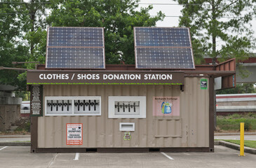 Neighborhood clothing donation station with solar panels Houston, Texas USA 06-04-2025.