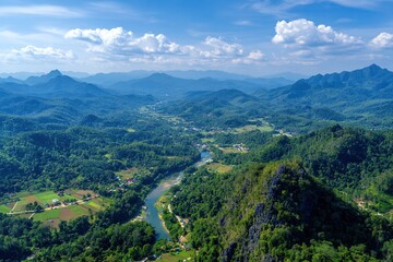 A vibrant aerial view of a lush green forest and winding river, capturing the beauty of nature from above
