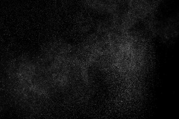 Abstract splashes of water on a black background.