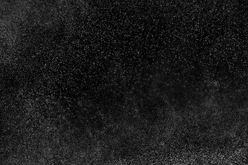 Abstract splashes of water on a black background.