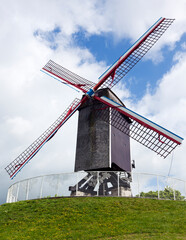 Historic windmill on the dike at Bruges, Belgium
