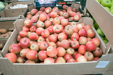 Freshly harvested apples displayed in a market ready for shoppers during the autumn season