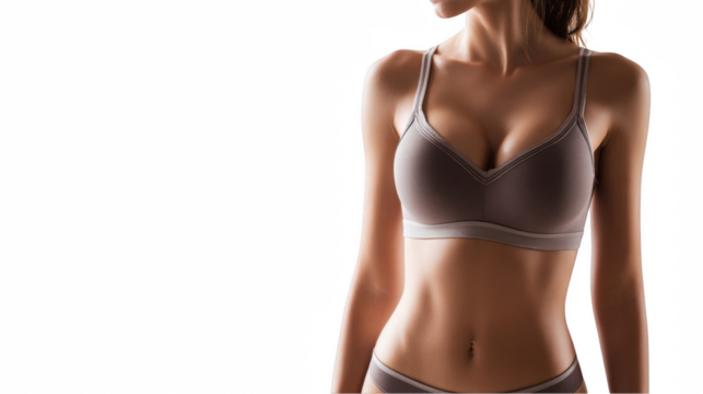 Fit, athletic woman is posing in sports underwear, showcasing her toned abs and healthy physique against a transparent background, ideal for fitness and health related projects