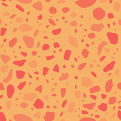 Seamless abstract pattern featuring irregular shapes in shades of pink against a soft orange background. Ideal for textiles or wallpaper.