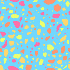Colorful abstract pattern of assorted shapes in pink, yellow, and orange over a light blue background. Fun and playful design.