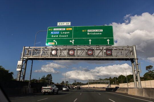 road signs over the motorway heading towards Brisbane or the Gold Coast