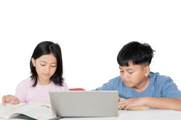 Focused Asian Children Studying Together with Books and Laptop