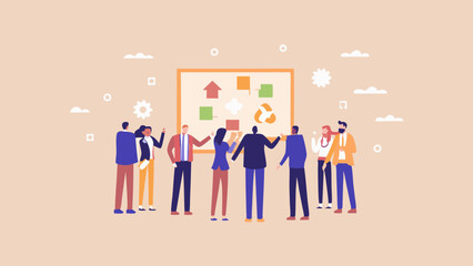 Group of people standing and discussing in front of a whiteboard with icons and shapes displayed on it