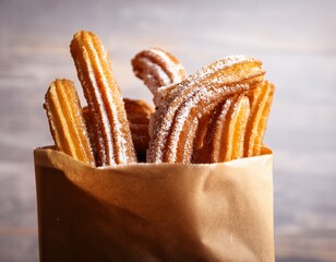 delicious churros with powdered sugar in paper bag close up of a paper bag filled with freshly made churros dusted with powdered sugar