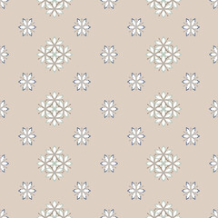 This fabric features a beige and light blue snowflake pattern with delicate and continuous motifs, suitable for winter-themed gift wrapping paper or decoration.