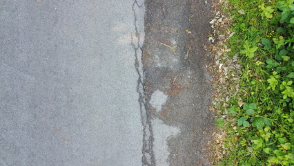 Aerial View of Storton Woods, Birkenhead – cracked roadwork and nearby foliage ideal for graphic resourcing. 