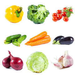 Set of fresh ripe vegetables and greens isolated on white background.