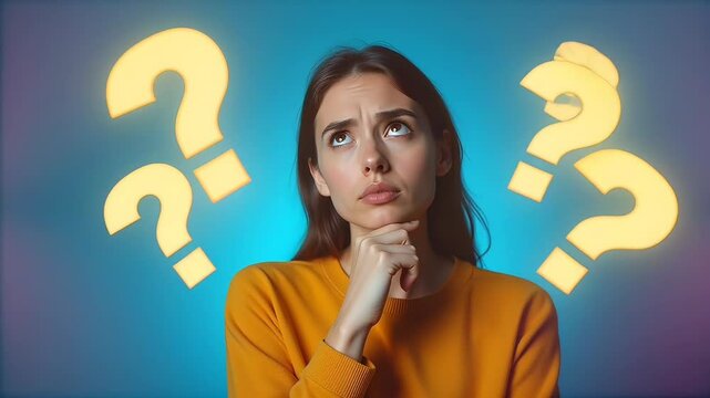 Confused woman thinking with question marks around
